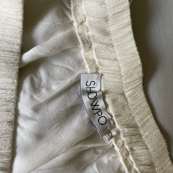 White, over the shoulder crop top with detailed sleeves. - Picture 6 of 8